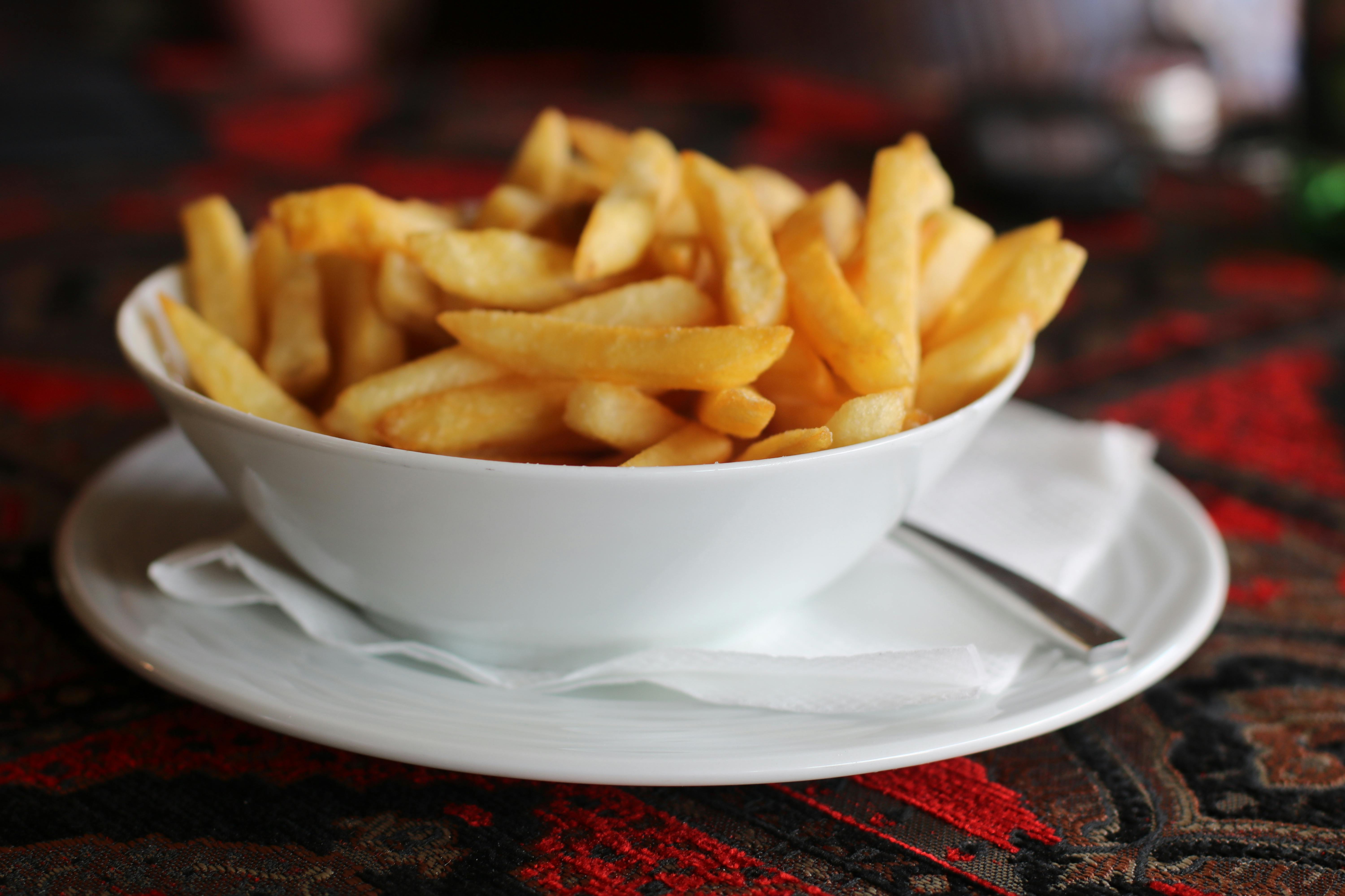 Plated bowl of fries